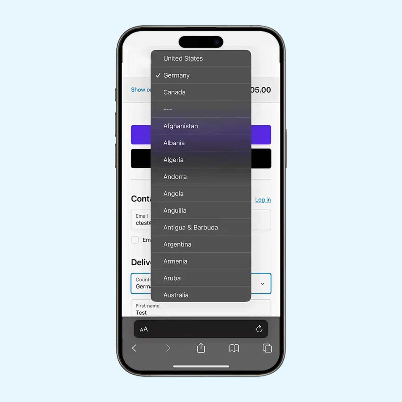 A handy phone shows ShipMonk.com’s checkout form, dropdown open, offering country choices from Germany to Algeria and beyond. via ShipMonk.com