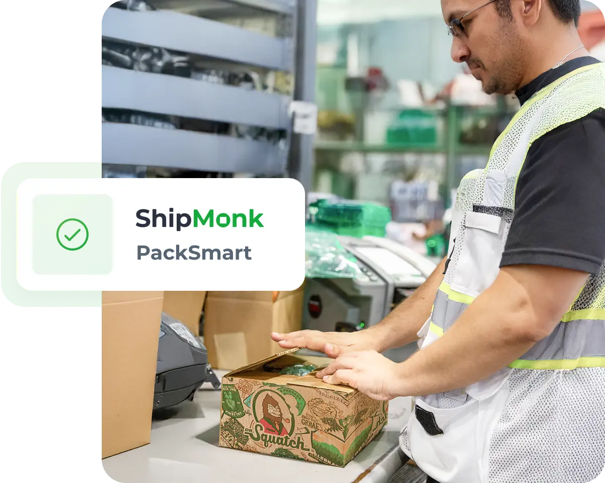 With careful hands, a worker in a safety vest seals a box—ShipMonk.com’s PackSmart seal shines with a friendly green check. via ShipMonk.com